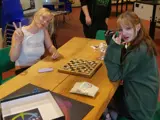Two girls playing chess